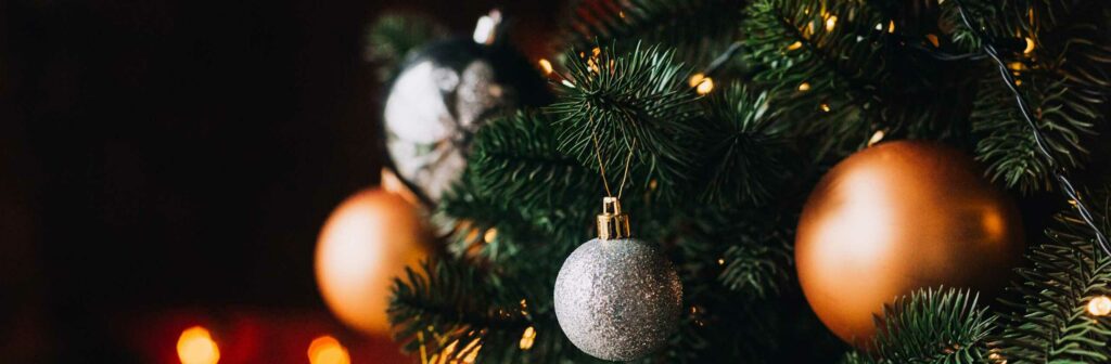 Christmas Tree close up with orange ornaments