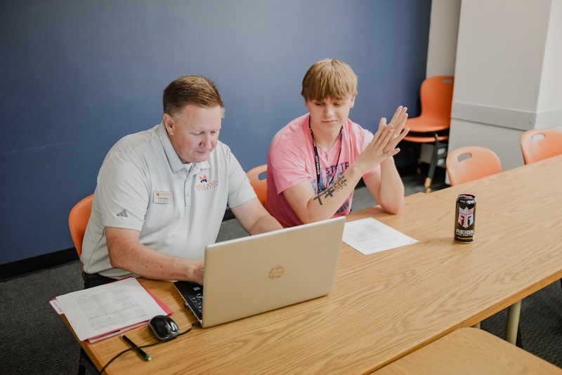 Midland University Students Running on Track