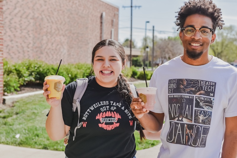 Midland University Students Walking Across Campus