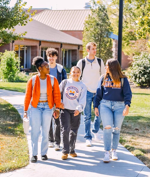 Students walking across campus